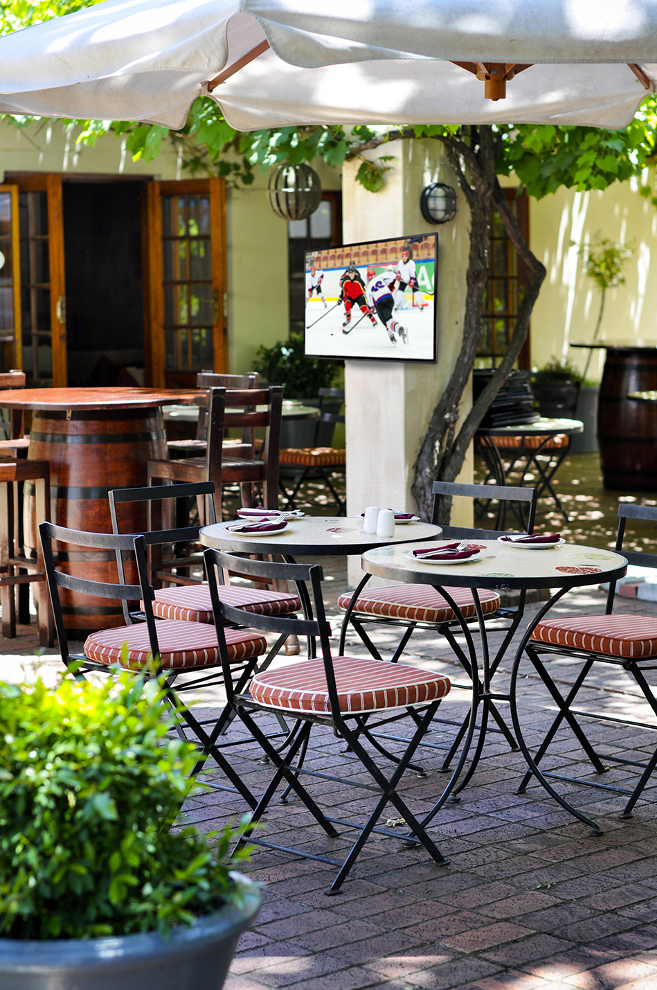 Clearview TV Mirror installed in an outdoor bar